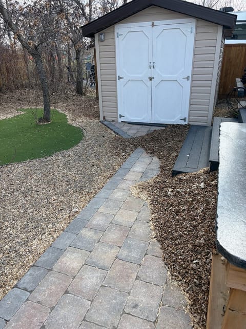 Before the spring cleanup: Paver path to the shed