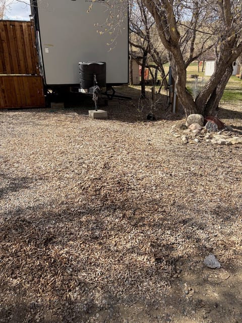Before the spring cleanup: Gravel pad and rock bed