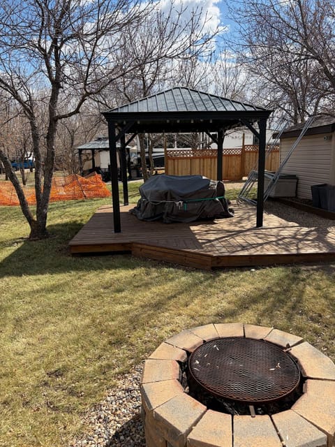 After the spring cleanup: Gazebo and fire pit